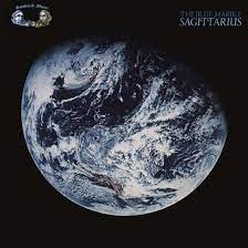 Sagittarius - Blue Marble (White Vinyl) ryhmässä VINYYLI @ Bengans Skivbutik AB (3635108)
