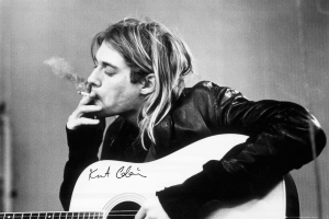 Kurt Cobain - Smoking Acoustic Guitar 91,5 X 61 Cm ryhmässä Merchandise @ Bengans Skivbutik AB (5634282)