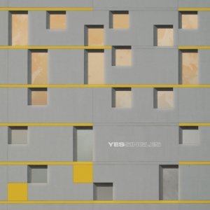 Yes - Yessingles (Yellow/Orange/Black Splatter Vinyl) (Rocktober) ryhmässä ME SUOSITTELEMME / Rocktober @ Bengans Skivbutik AB (5641291)