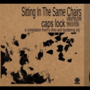 Caps Lock Compilation - Sitting In The Same Chairs ryhmässä VINYYLI / Kommande / Pop-Rock @ Bengans Skivbutik AB (5652857)